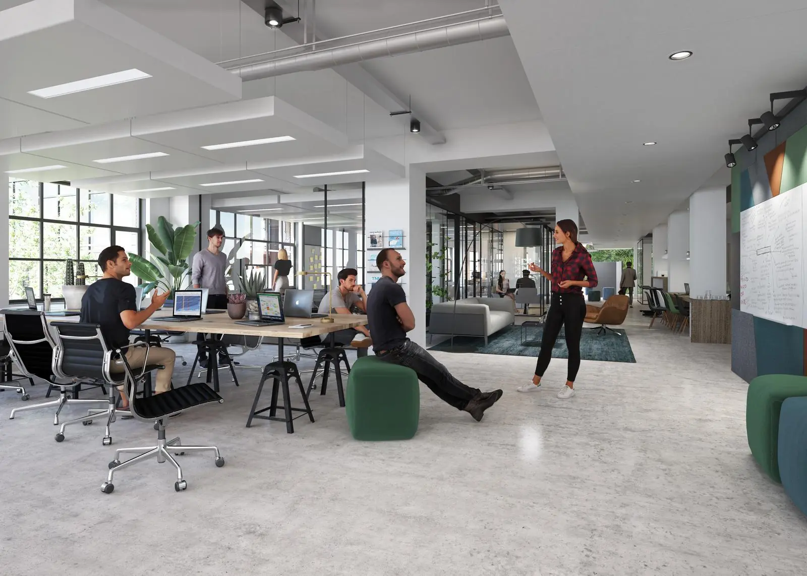 Moderne open kantoorruimte aan de Karl Weisbardstraat met mensen die samenwerken en overleggen.